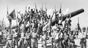 Japanese Soldiers On Captured American Gun