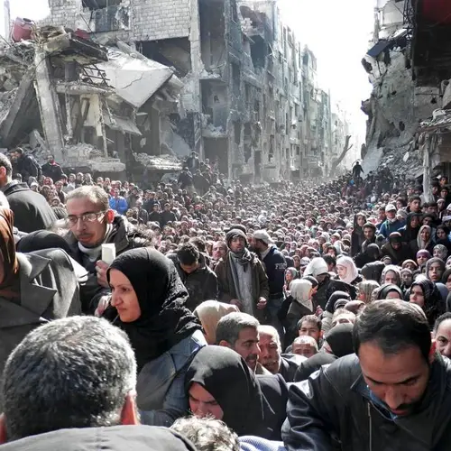 The Queue For Food In A Syrian Refugee Camp