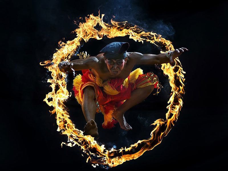 Man Jumps Through Fire