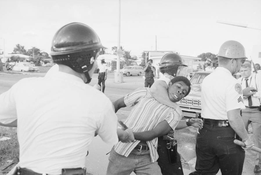 Man Dragged Away