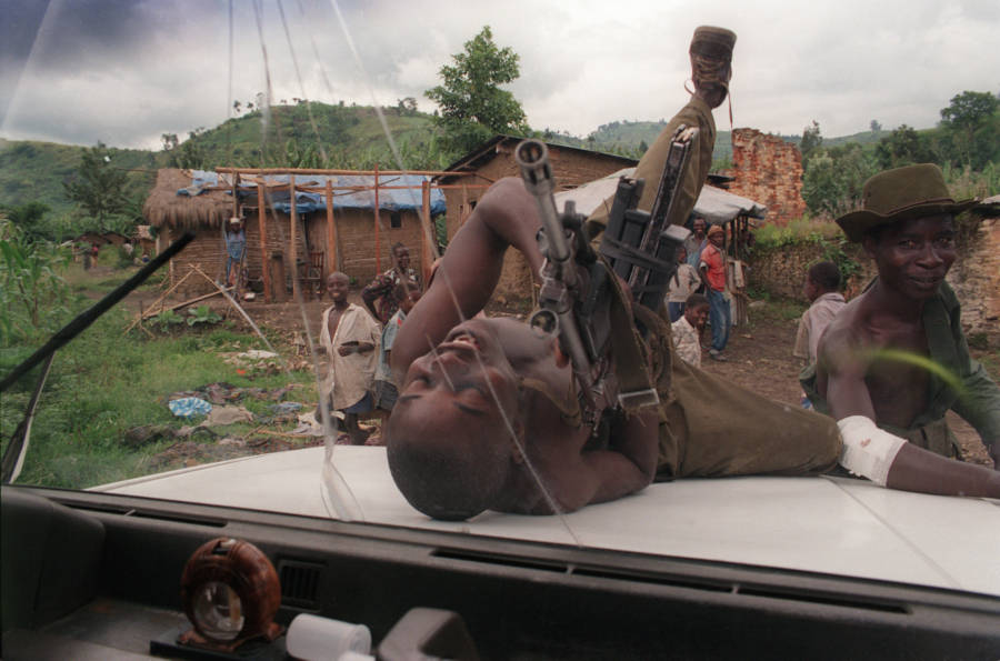 Congo Child Soldier Playing With Gun