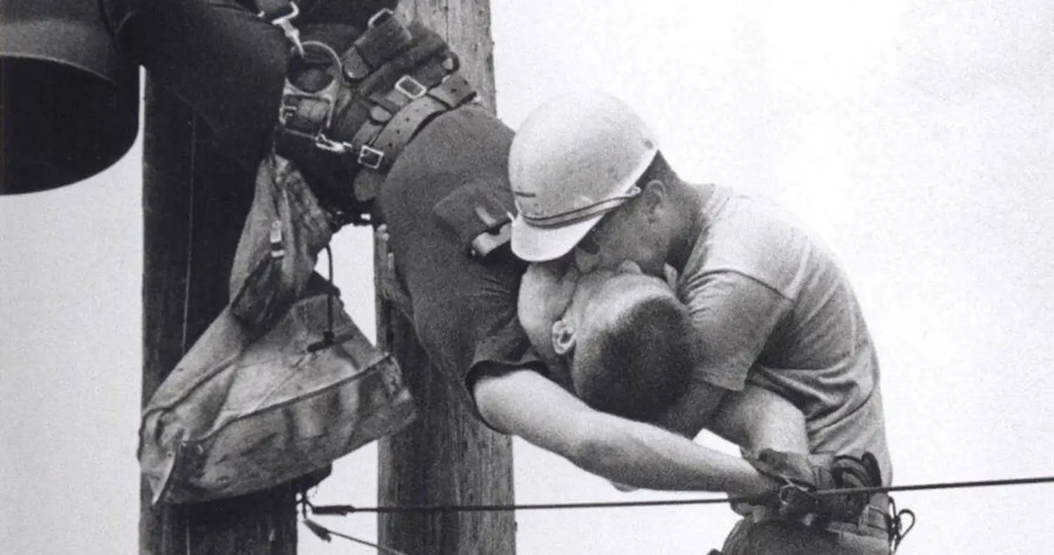 The True Story Behind The Iconic 'Kiss Of Life' Photo