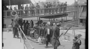 Immigrants Arriving At Ellis Island