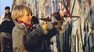 Kid Tries To Hammer Through Berlin Wall