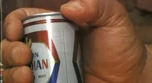 Holding A Beer Can