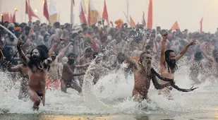 Kumbh Mela Charging Into Water