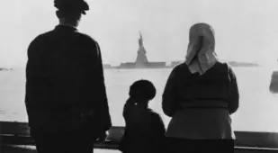 Ellis Island Immigrants Look At The Statue Of Liberty