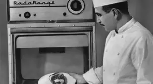 Accidental Inventions Chef putting food in microwave