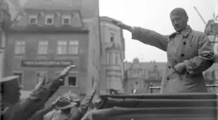 Hitler Salutes His Supporters