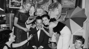 Hugh Hefner Surrounded By Bunnies