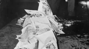 Shroud Of Newspapers