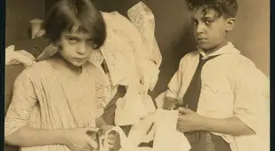 Boy And Girl Working With Lace