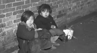 Children Against Wall During Chinese Civil War