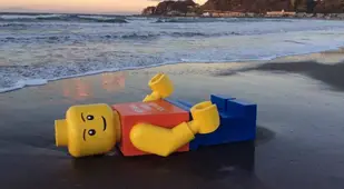 Large Lego Man On Beach