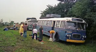 Hippies Boarding Buses