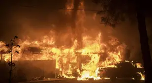 Fire Tornado Over Burning House