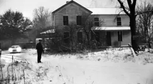 Sheriff Stands Outside Gein's House