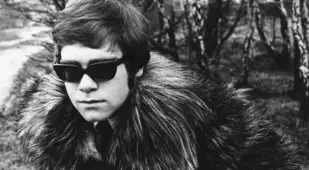 Elton John In Furs And Glasses