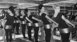 Women On Vintage Workout Machines