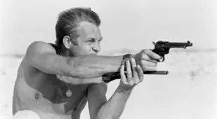 Shirtless Steve Mcqueen Shooting A Gun