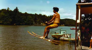 Waterskiing At American 1970s Summer Camp