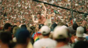 Cheering Fan Crowd Surfing At Woodstock 99