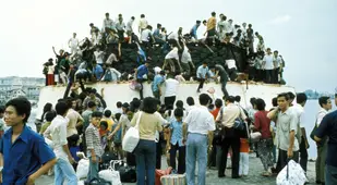 South Vietnamese People On A Barge During The Fall Of Saigon