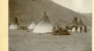 Men In Front Of Teepees