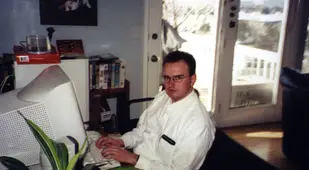 Man At His Home Computer