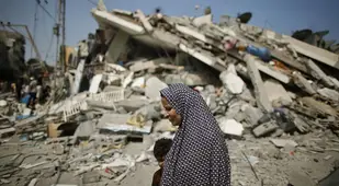 Occupied Palestine Woman Rubble