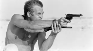 Shirtless Steve Mcqueen Shooting A Gun