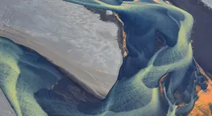 Astounding Aerial Photography Glacial River In Iceland
