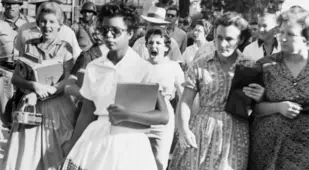 Angry Crowd Following Girl