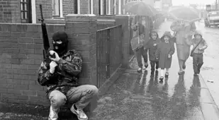 Armed Man In Mask