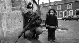 Child Near Armed Man