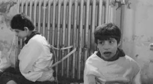 Children Tied To A Radiator