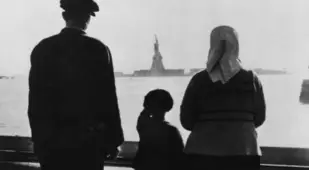 Ellis Island Immigrants Look At The Statue Of Liberty