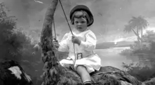 Child On Stuffed Ostrich