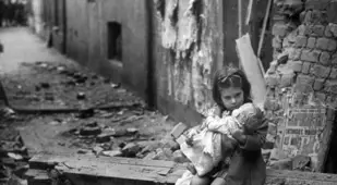 A Girl Holding A Doll