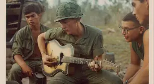 Gathering Around A Guitar