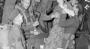 Girl Lifted Up For A Goodbye Kiss