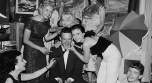 Hugh Hefner Surrounded By Bunnies