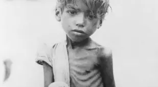 Starving Bengali child with an outstretched hand