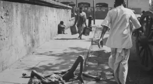 Starving Bengali woman on roadside