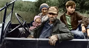 Poor Family Sitting In Car
