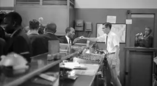 Business Owner Serving Black Patron