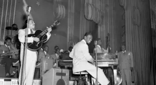 Nat King Cole Playing The Piano