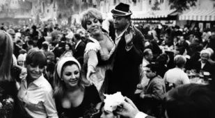 Beer Maid And Oktoberfest Attendee Inside A Beer Hall