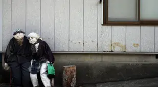 Dolls Outside Abandoned House