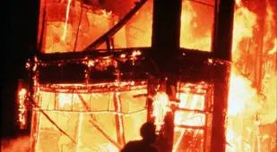 Running Past Fire During The Brixton Riots